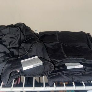 Two pairs of Victoria secret skinny leg leggings with pockets still with tags